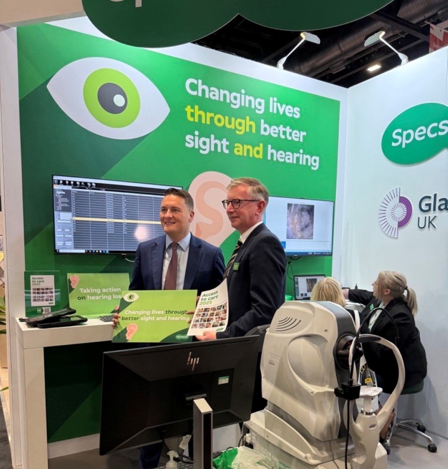 Health and Social Care Secretary Wes Streeting with Giles Edmonds at the Specsavers stand at the 2025 Labour party conference.